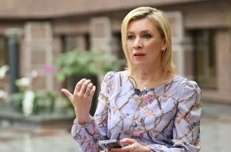 Захарова прокомментировала осквернение флага России в Грузии